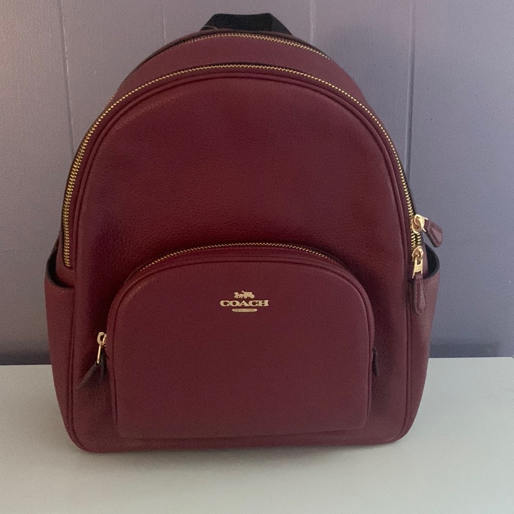 Coach leather court bag pack.  Black cherry NWT